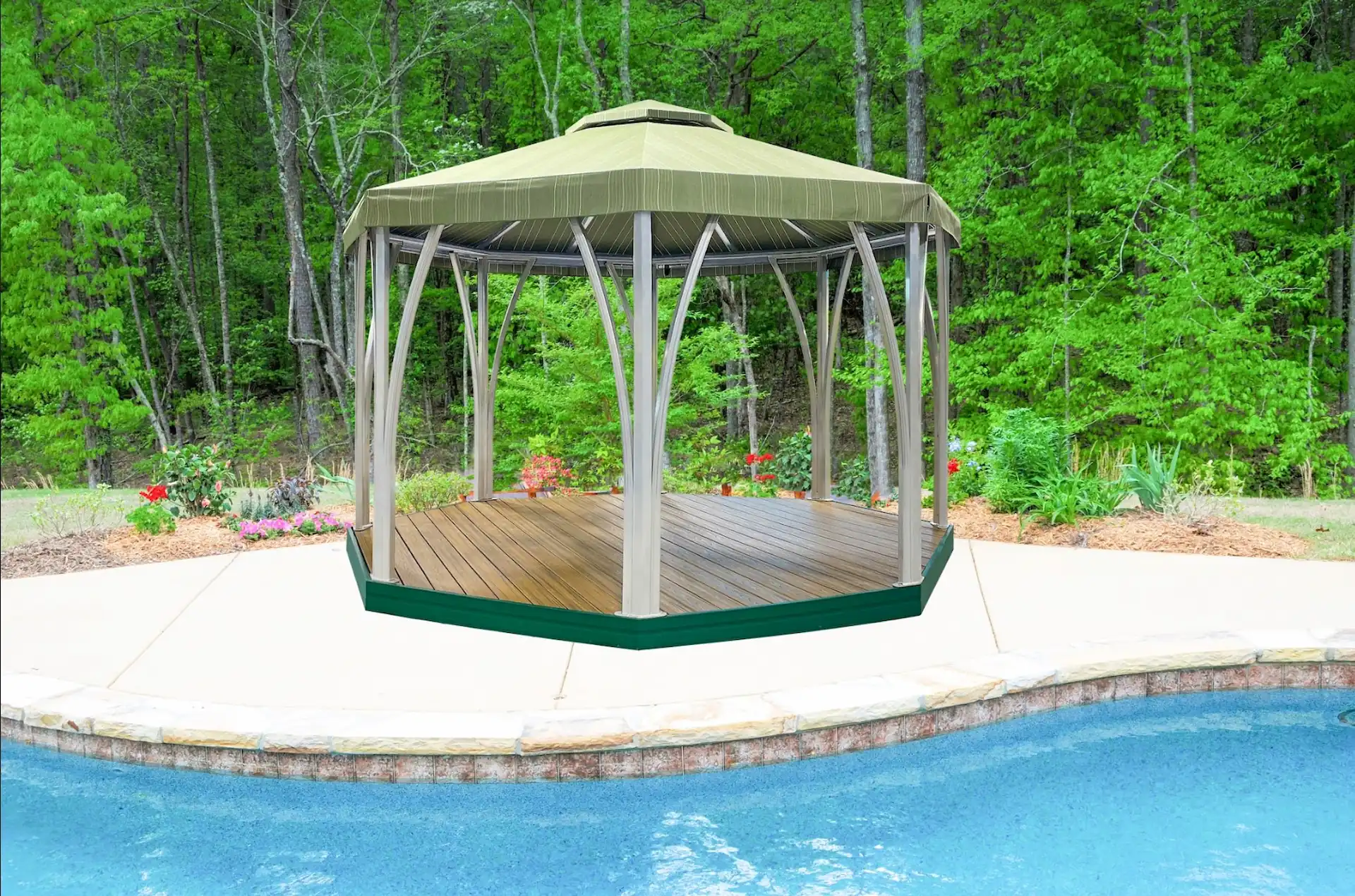 An octagonal open air cabana sits on a pool deck in the sunlight.